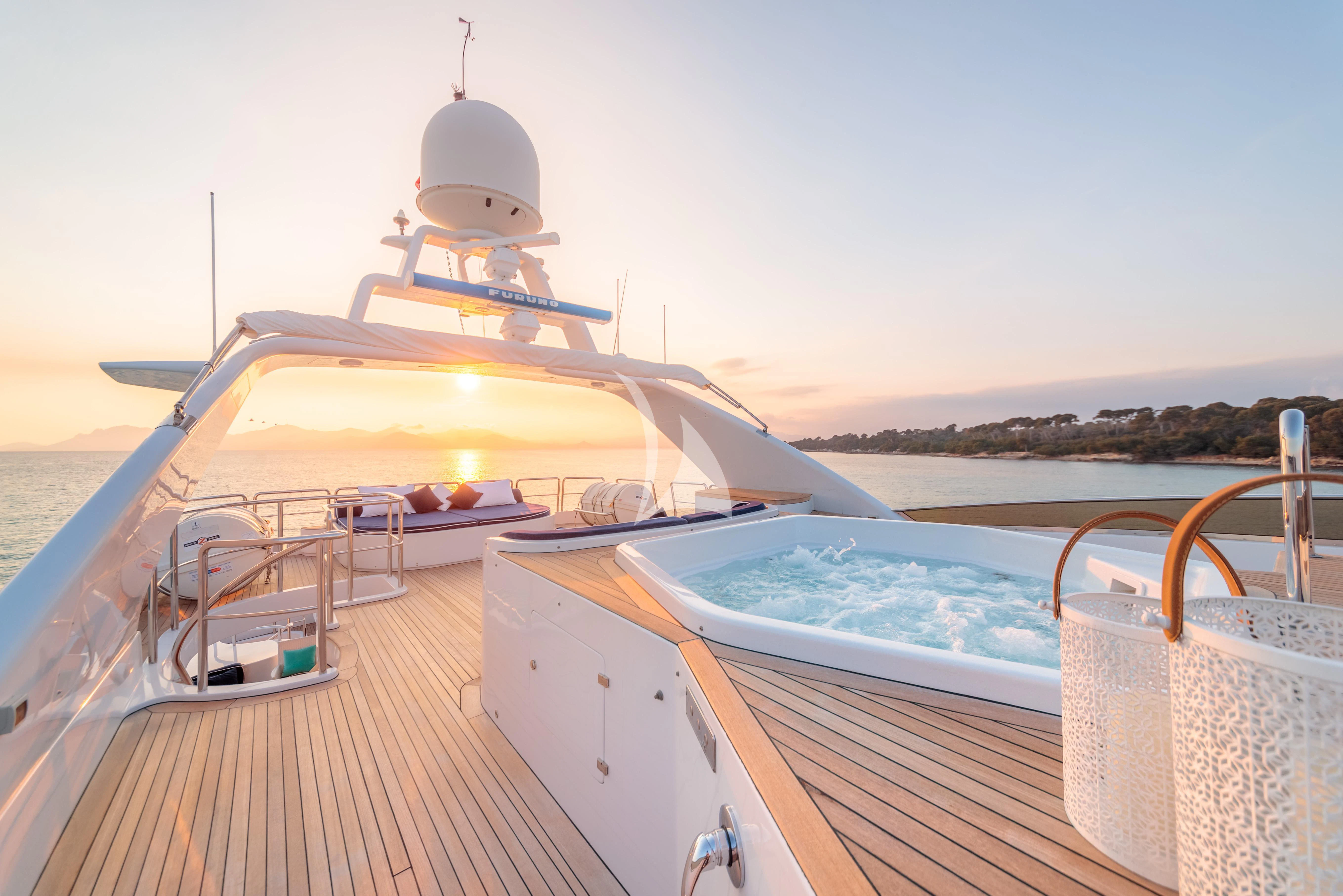 a boat on a deck aboard BANG! Yacht for Charter