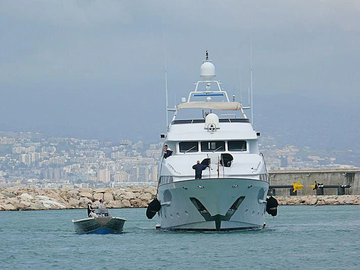 a couple of boats in the water aboard BANG! Yacht for Charter