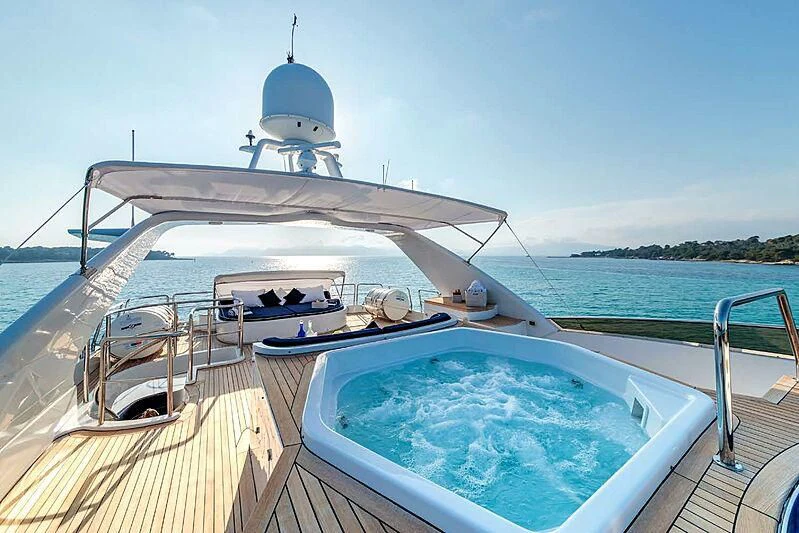 a boat on a body of water aboard BANG! Yacht for Charter
