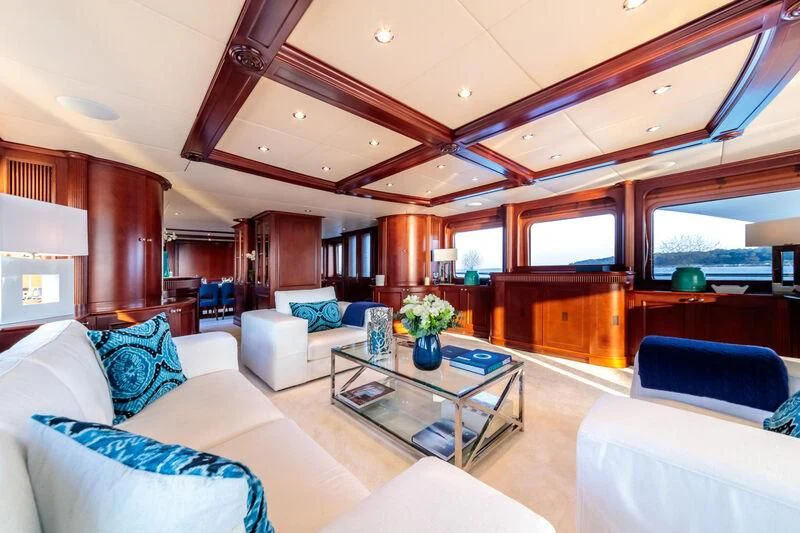a living room with a large ceiling aboard BANG! Yacht for Charter