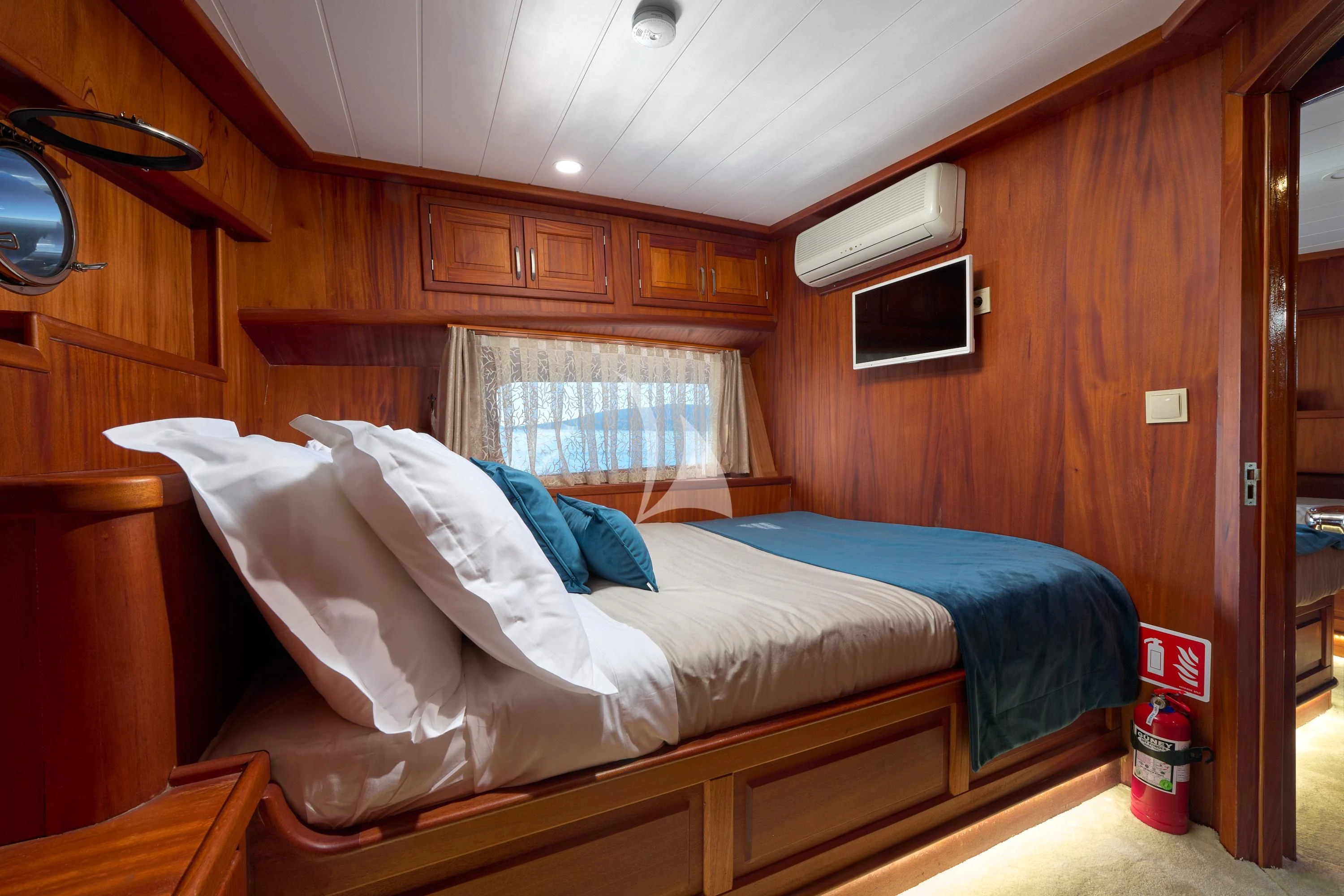 a bed in a cabin aboard SEA BREEZE Yacht for Charter