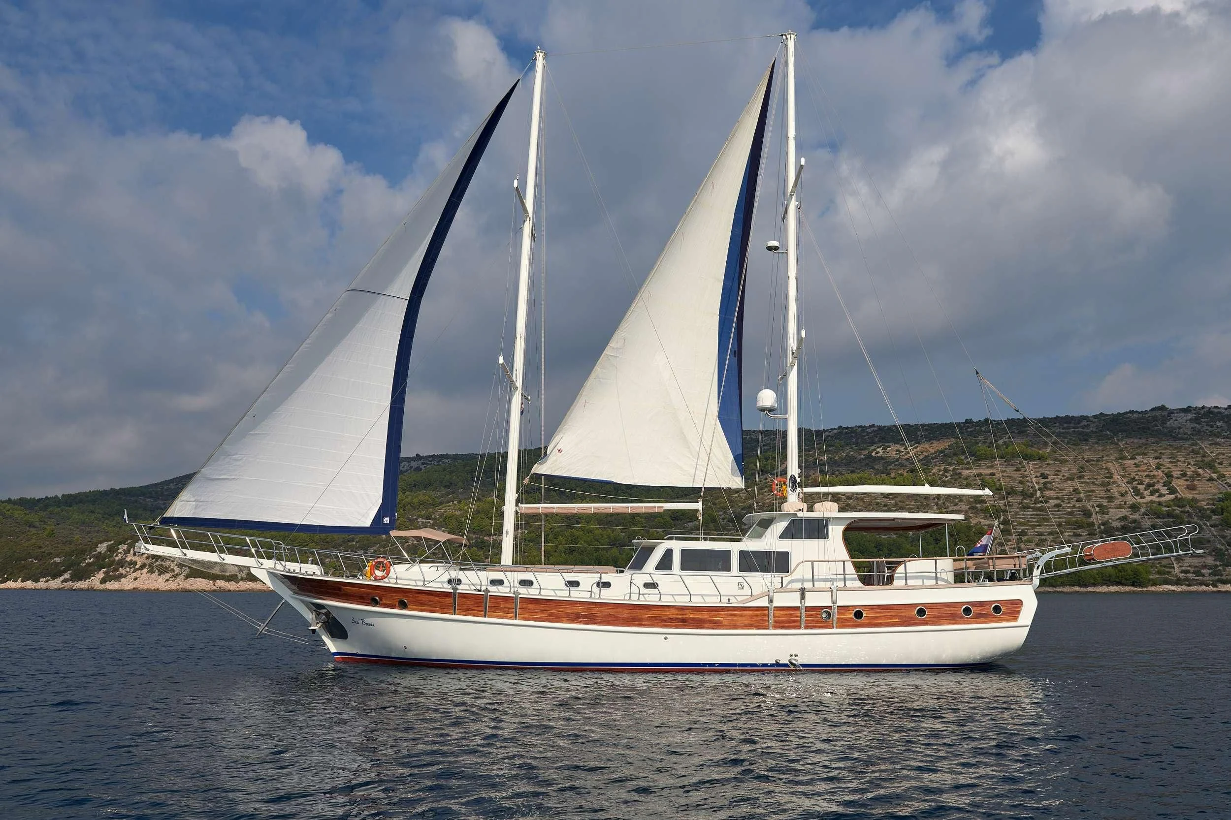 a sailboat on the water aboard SEA BREEZE Yacht for Charter