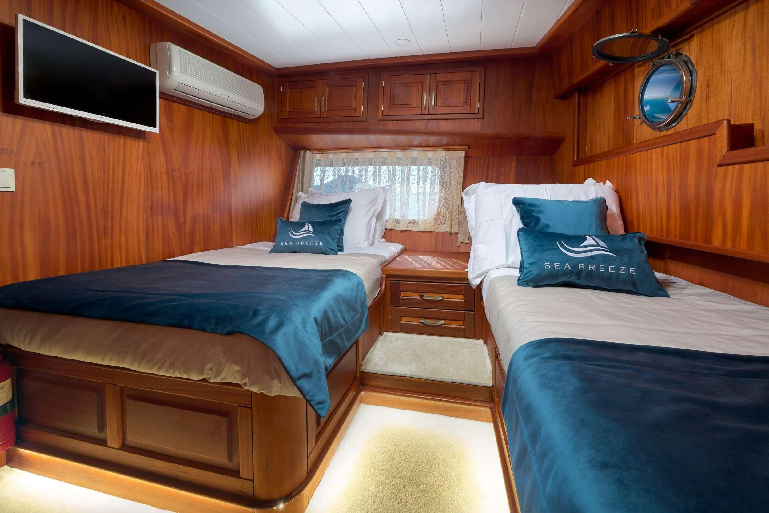 a room with two beds aboard SEA BREEZE Yacht for Charter