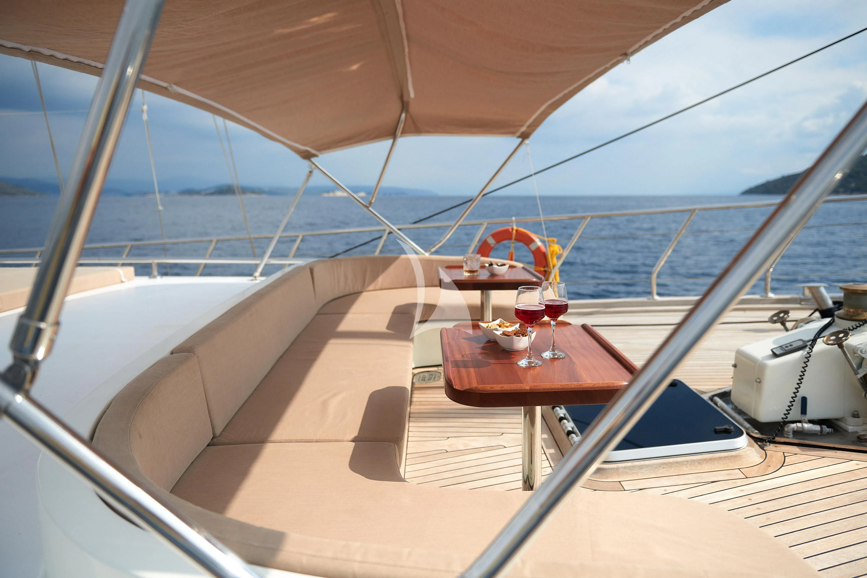 a glass of wine on a boat aboard SEA BREEZE Yacht for Charter
