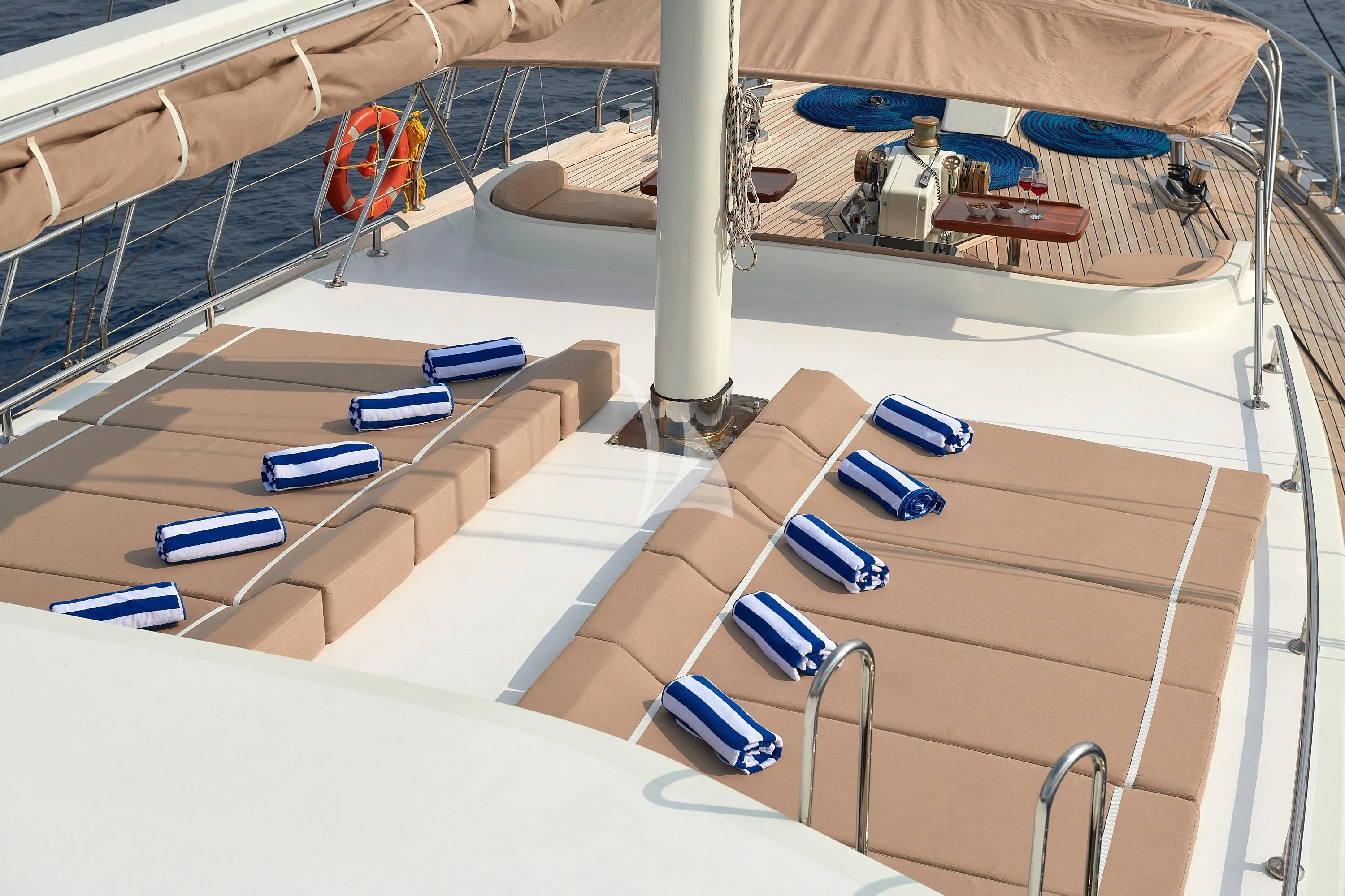 a room with a group of laptops and chairs aboard SEA BREEZE Yacht for Charter