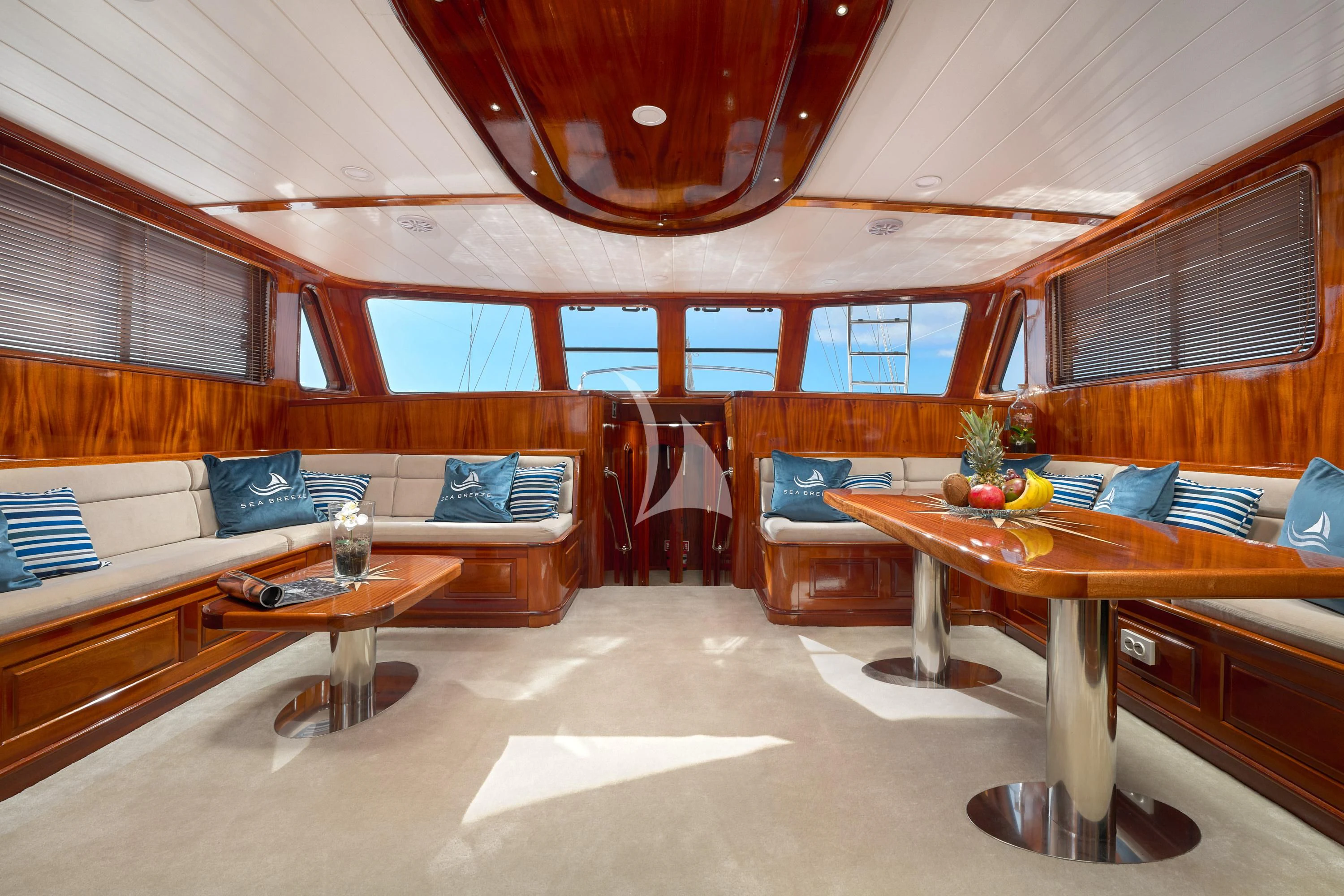 a room with a couch and a table aboard SEA BREEZE Yacht for Charter