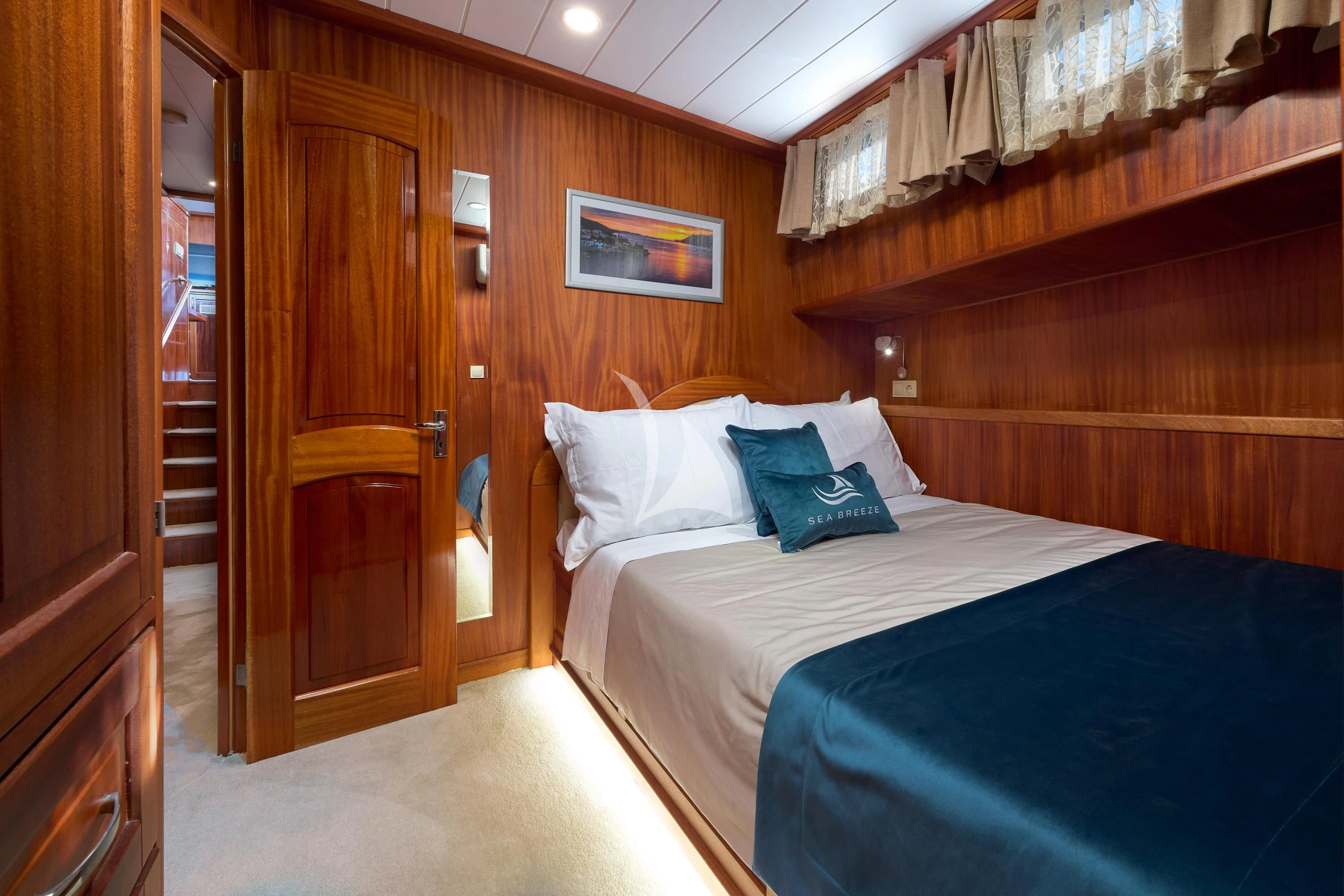 a bed in a room aboard SEA BREEZE Yacht for Charter