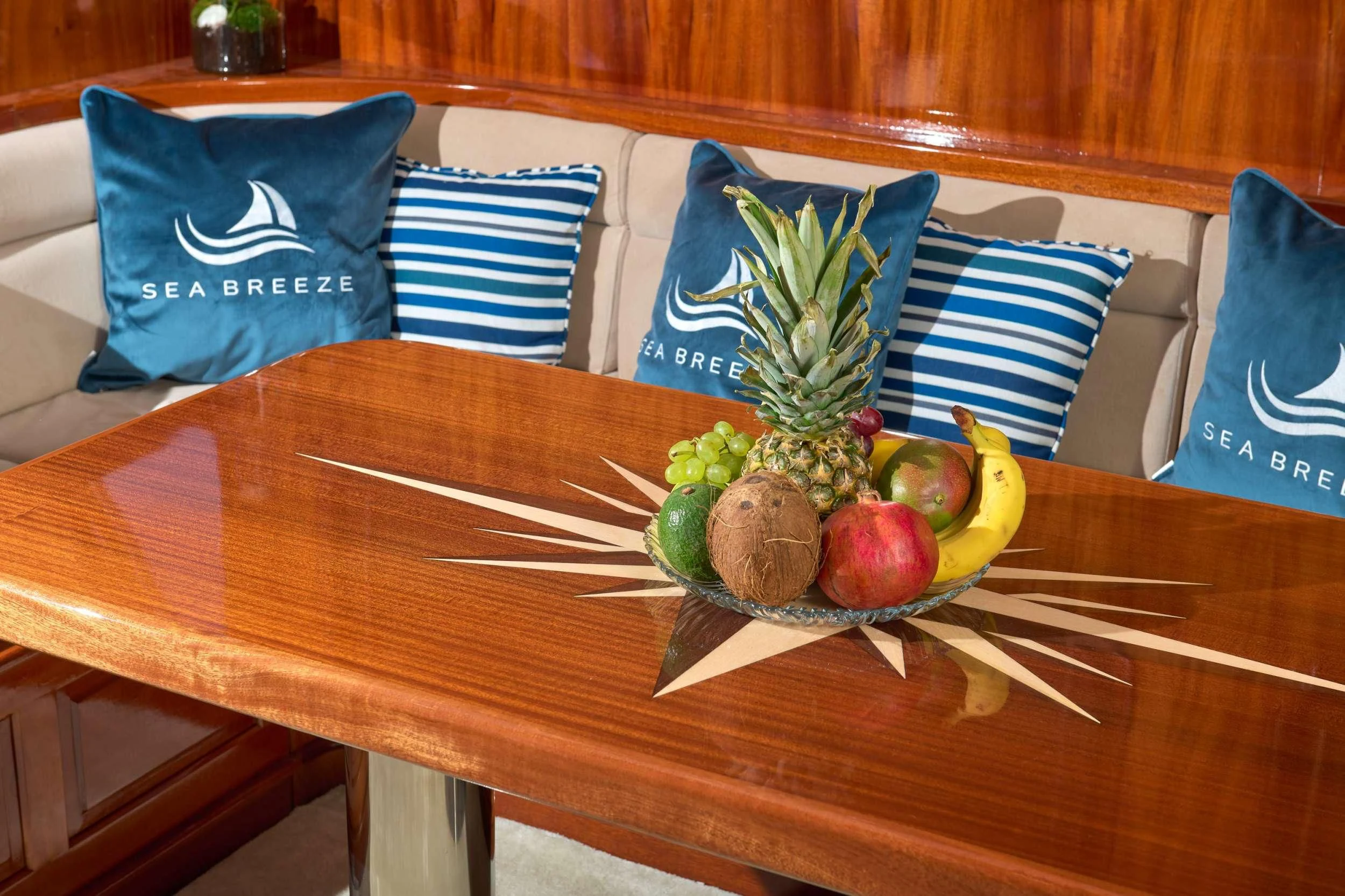 a table with fruit on it aboard SEA BREEZE Yacht for Charter