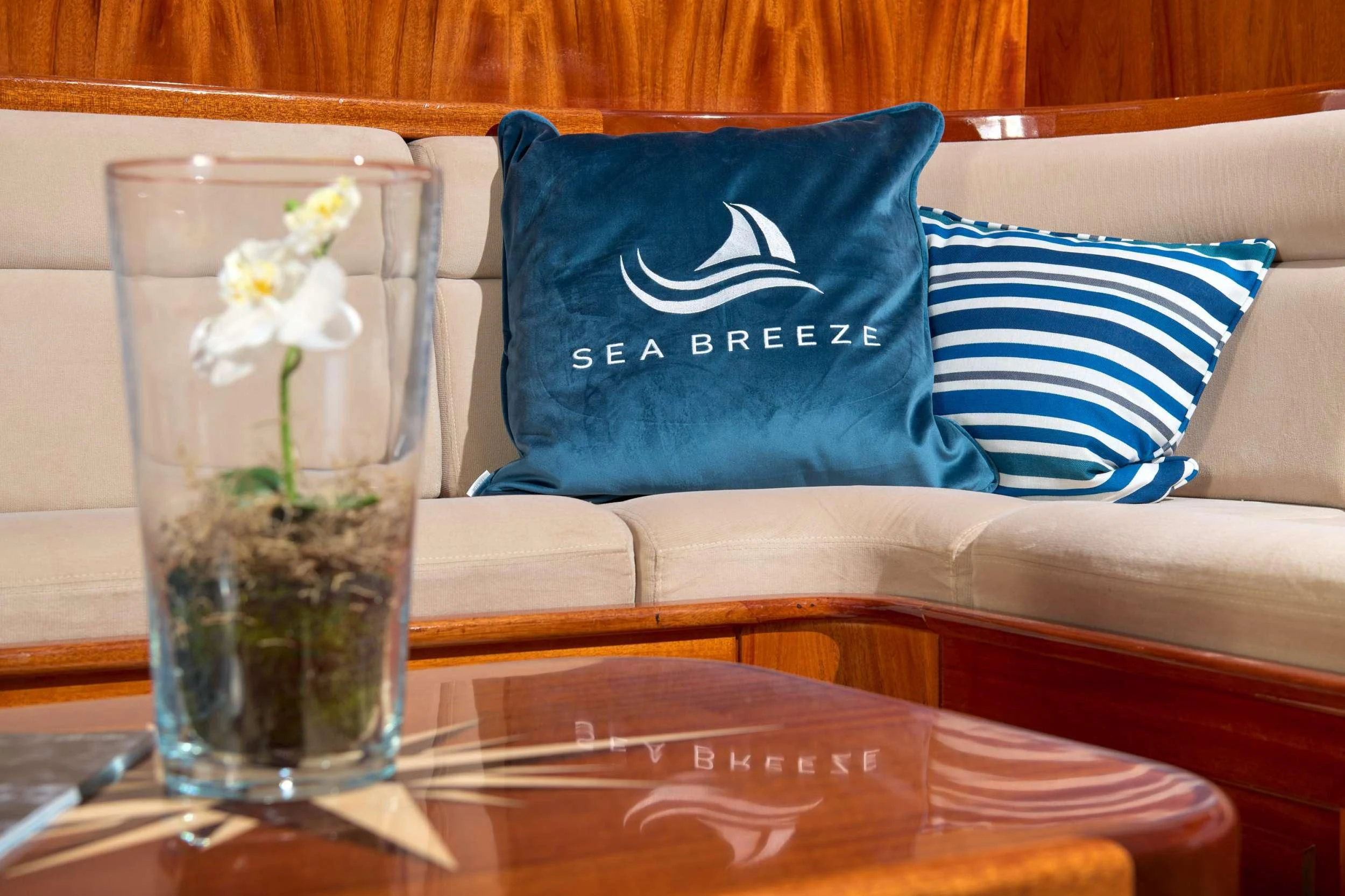 a vase of flowers on a table aboard SEA BREEZE Yacht for Charter