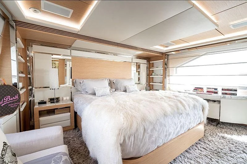 a bedroom with a large bed aboard PIXY Yacht for Sale