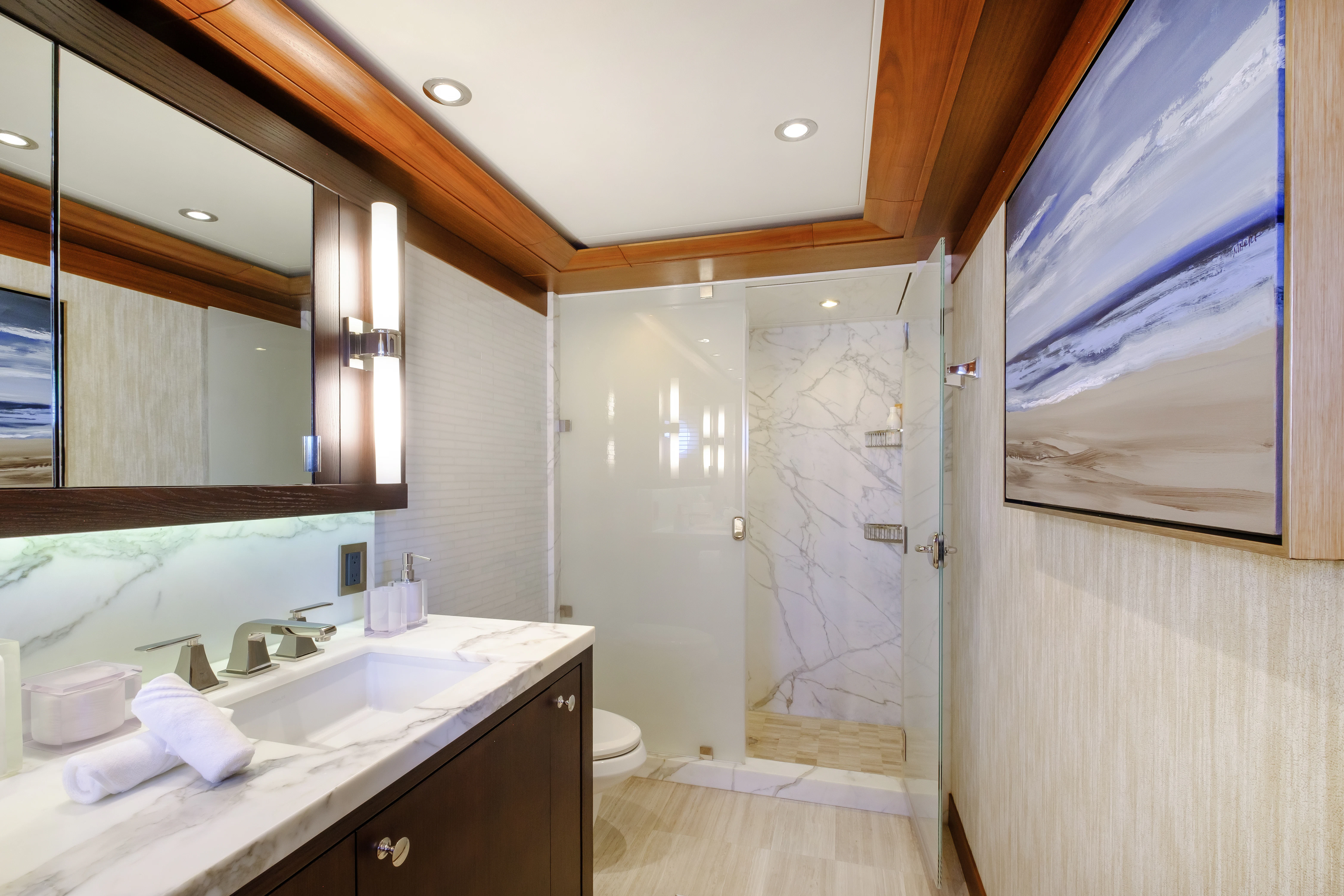 a bathroom with a sink and a mirror aboard MAISON BLANCHE Yacht for Charter