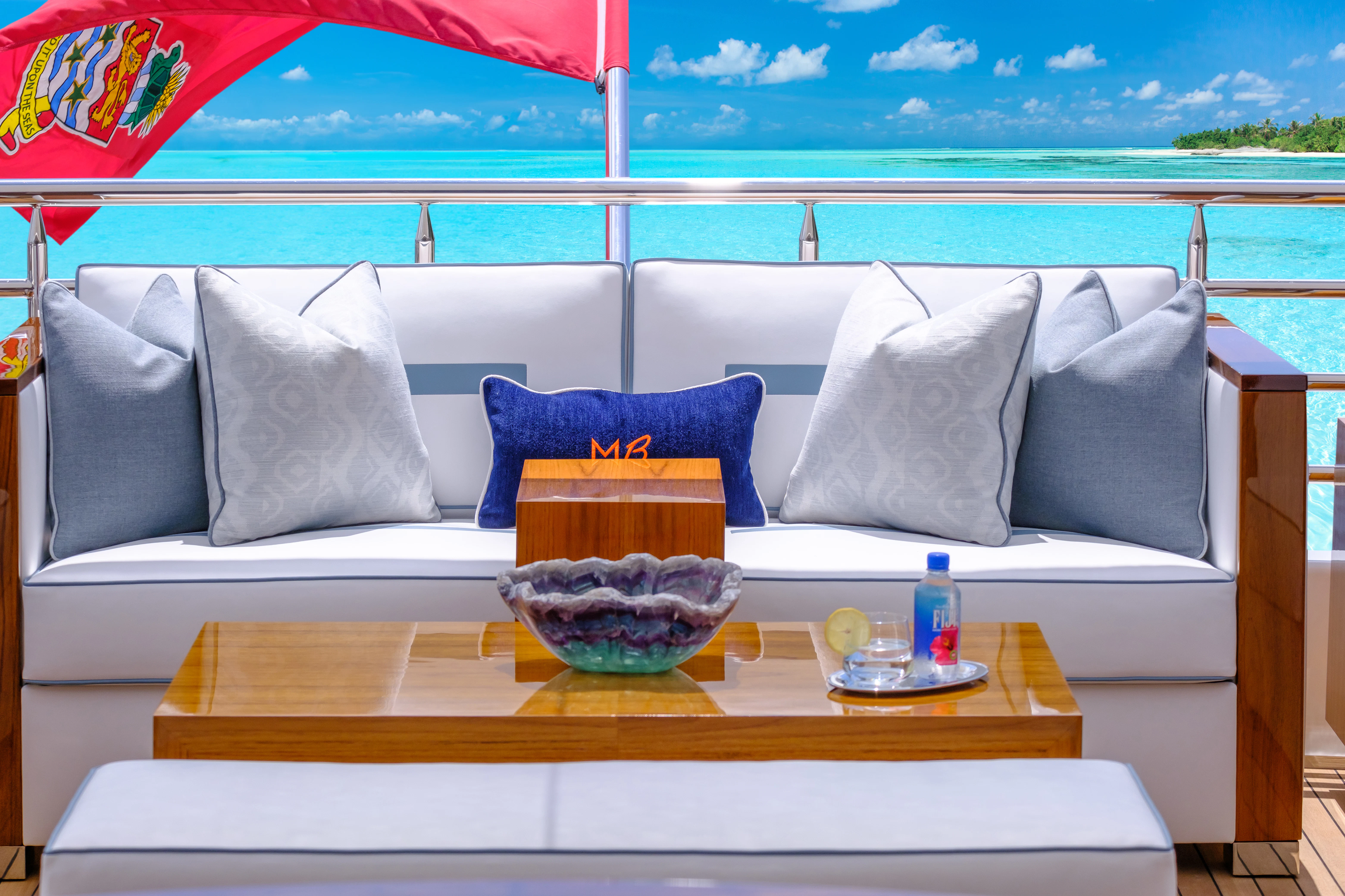 a table with a bowl of food on it aboard MAISON BLANCHE Yacht for Charter