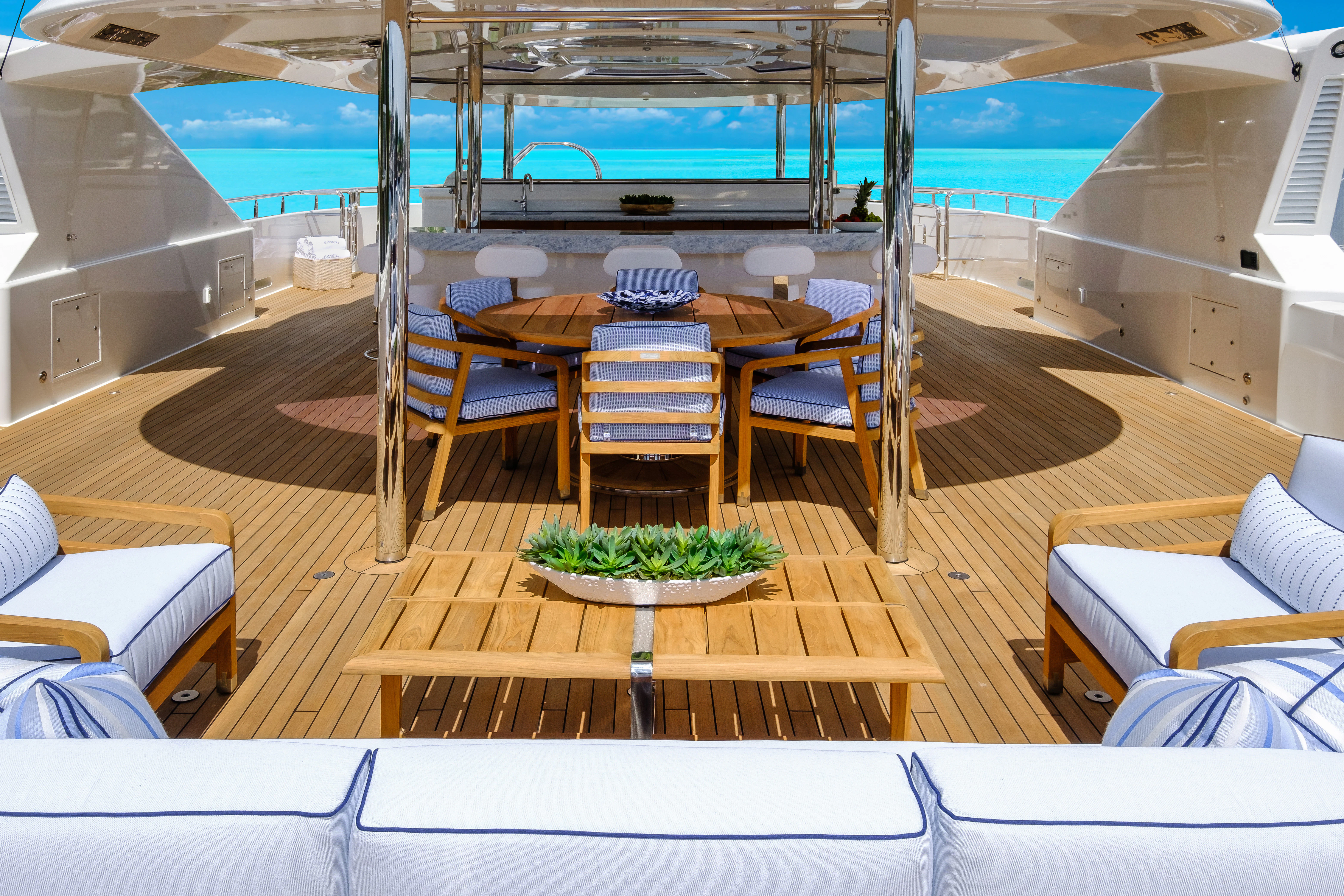 a room with a table and chairs aboard MAISON BLANCHE Yacht for Charter