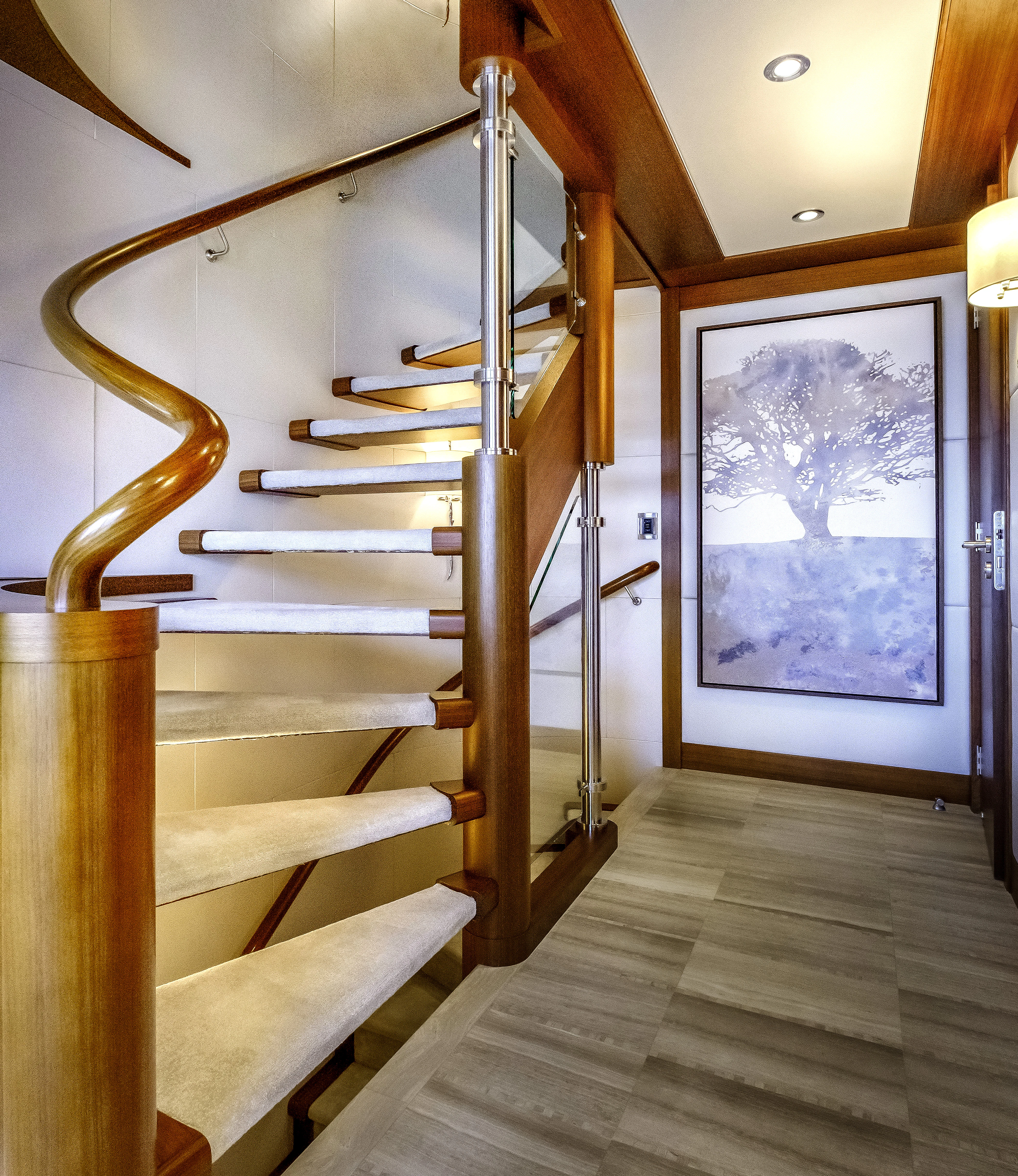 a wooden staircase in a house aboard MAISON BLANCHE Yacht for Charter