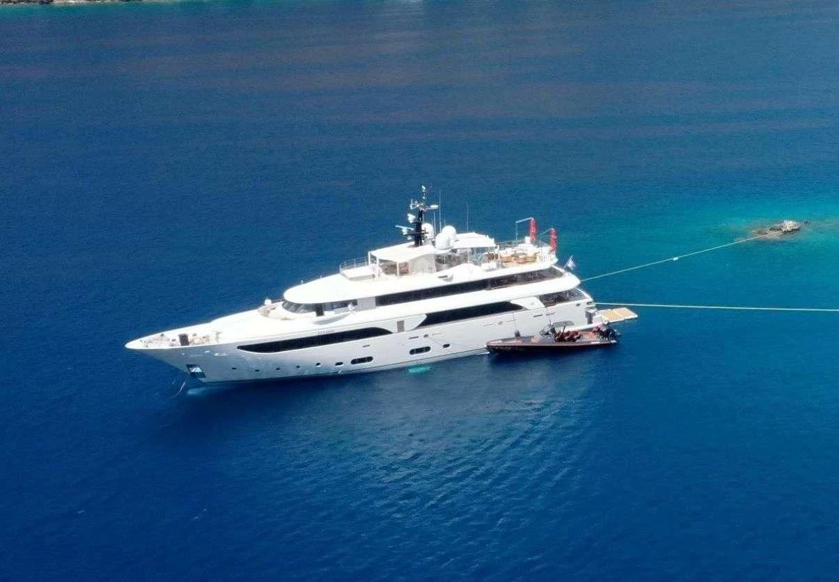 a white yacht in the water aboard PHOTON Yacht for Sale