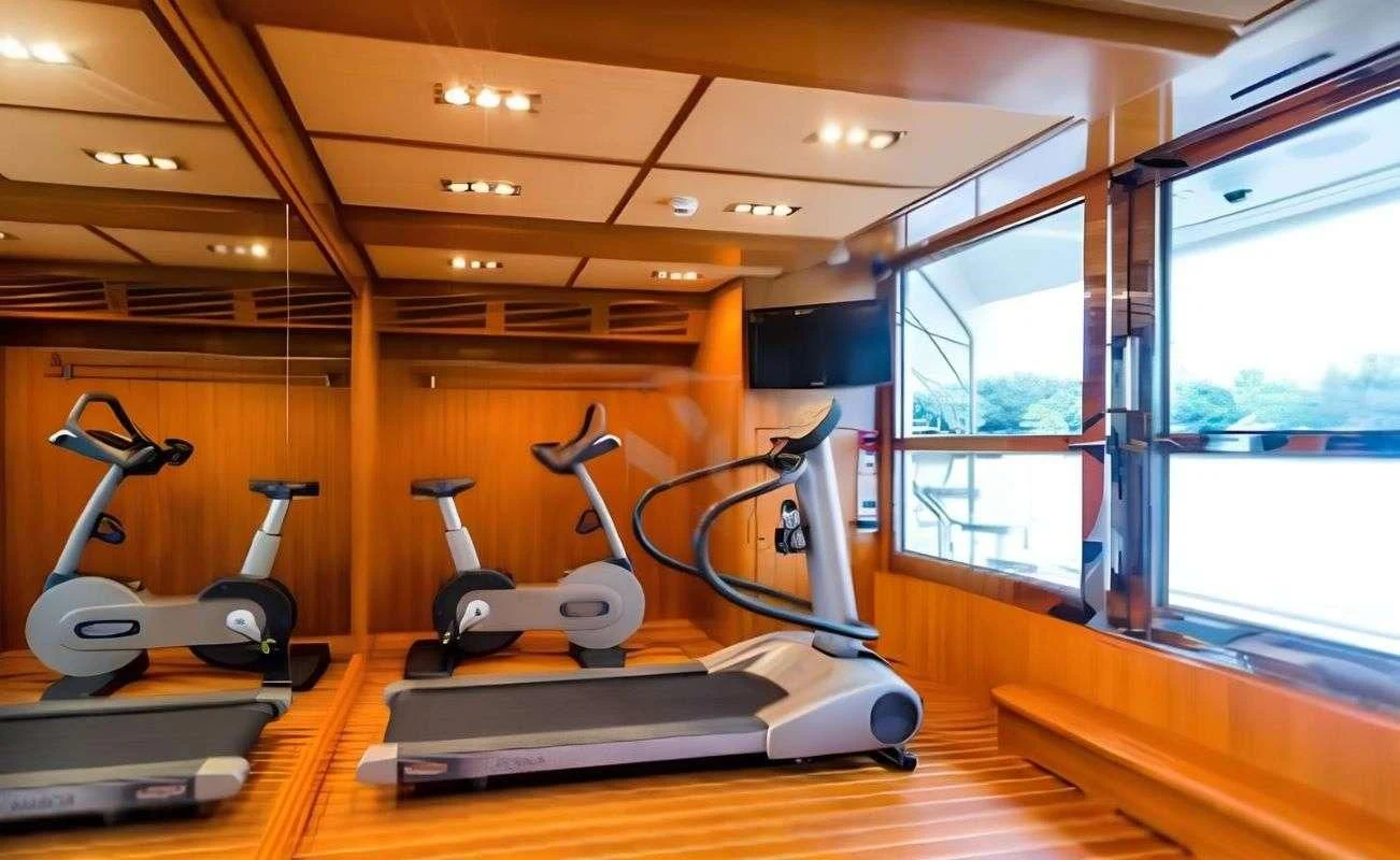 exercise equipment in a room aboard PHOTON Yacht for Sale