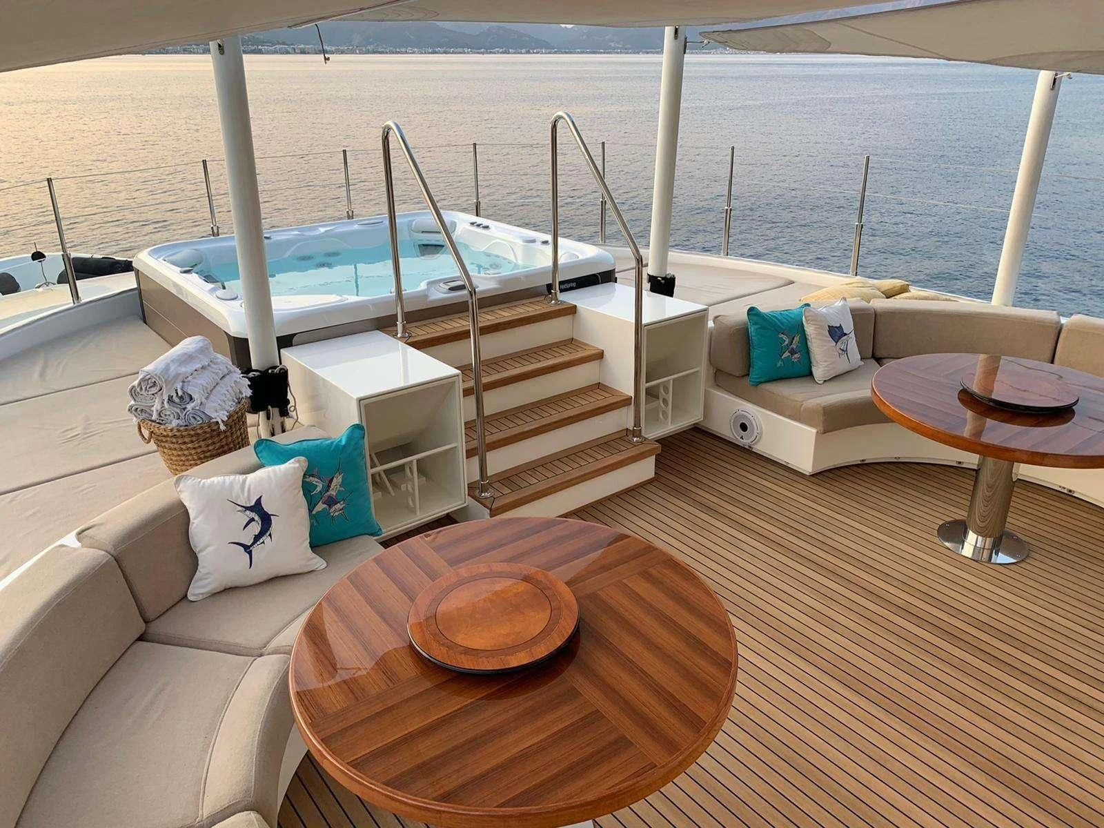 a boat on a deck aboard PHOTON Yacht for Sale