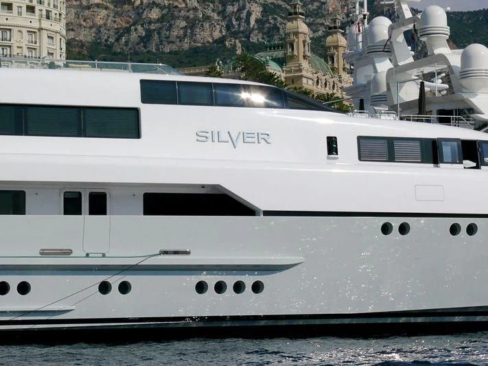 a large white yacht aboard RABDAN Yacht for Sale
