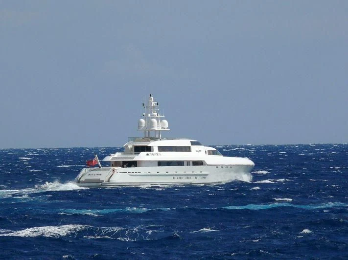 a white boat in the water aboard RABDAN Yacht for Sale