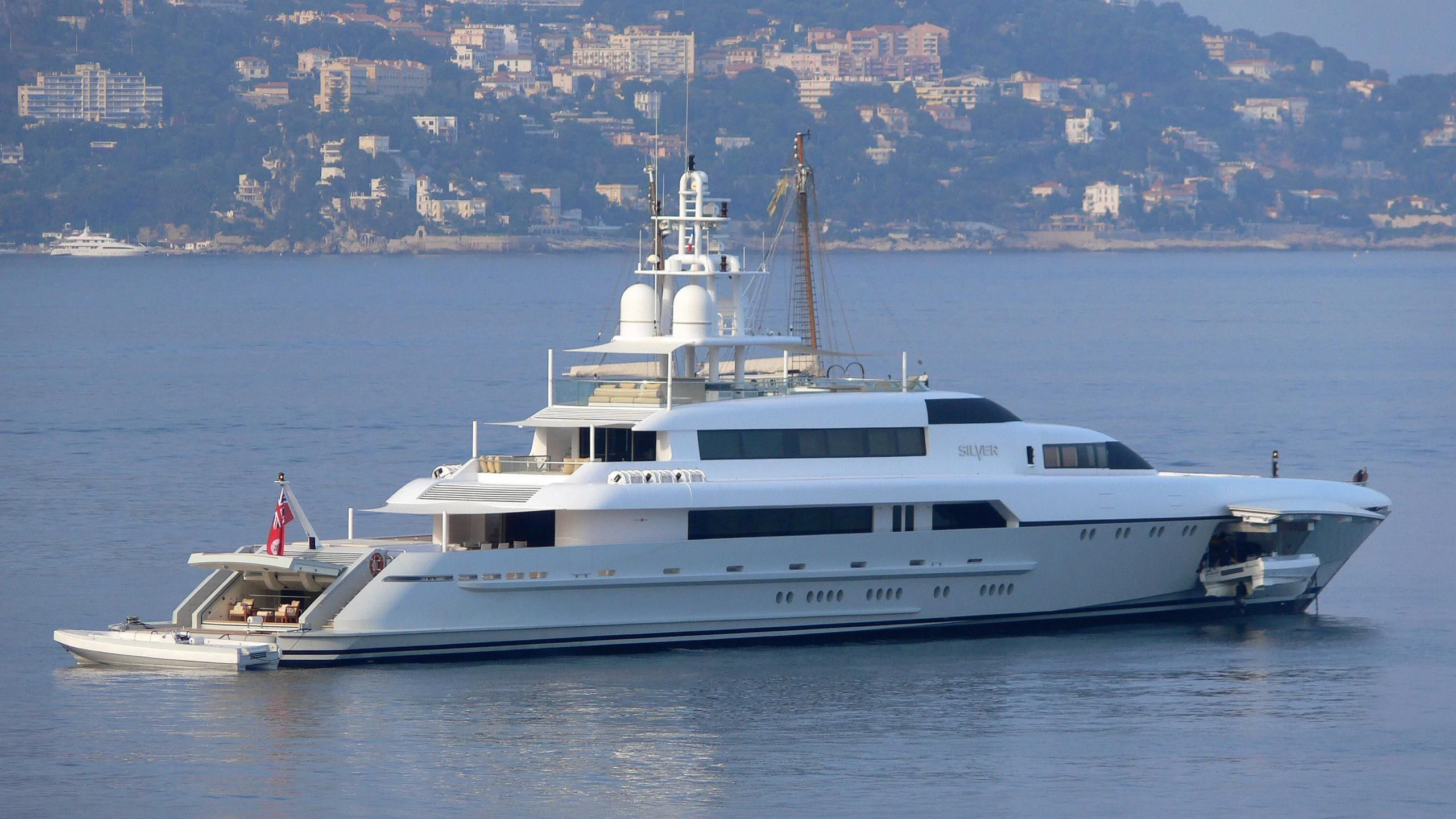 a white yacht on the water aboard RABDAN Yacht for Sale