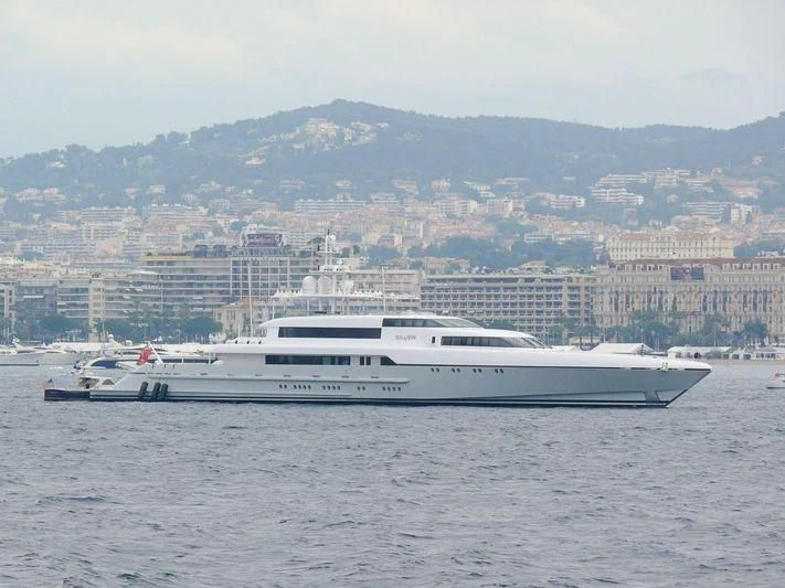 a white yacht in the water aboard RABDAN Yacht for Sale