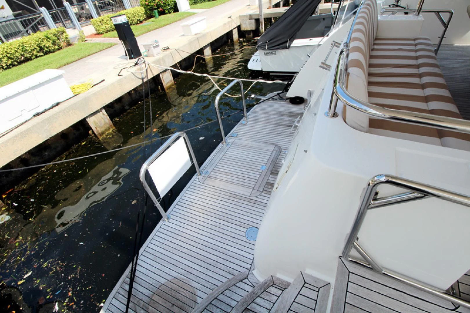 a boat with a hose attached to it aboard ALWAYS SOMETHING Yacht for Sale