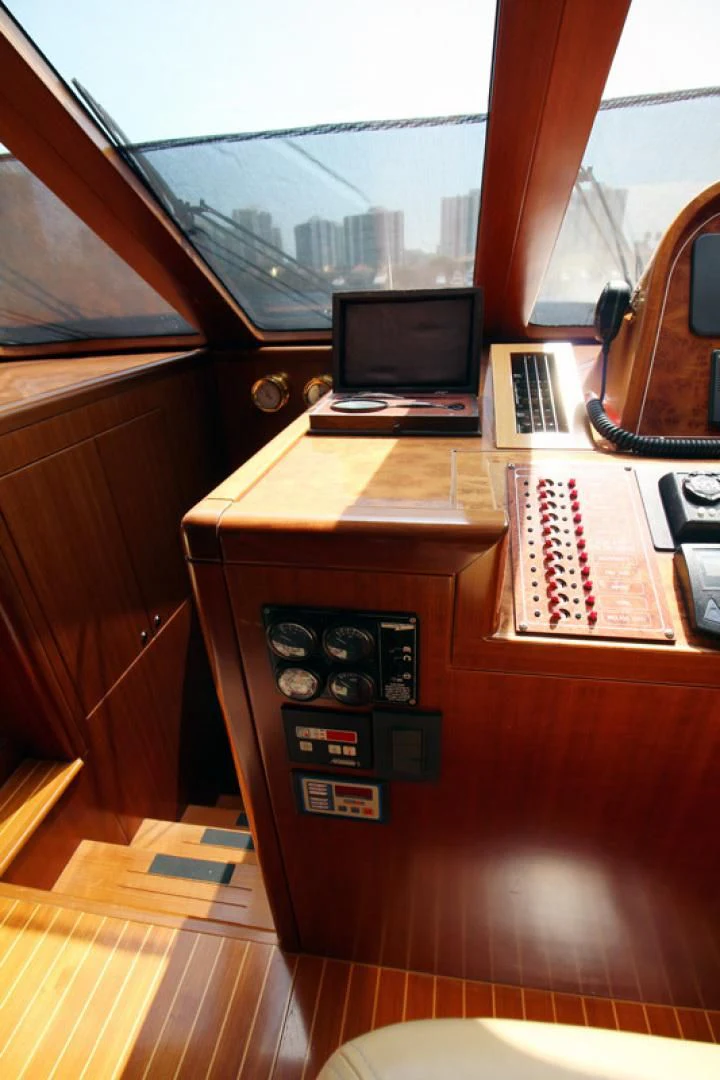 a desk with a laptop and a keyboard on it aboard ALWAYS SOMETHING Yacht for Sale