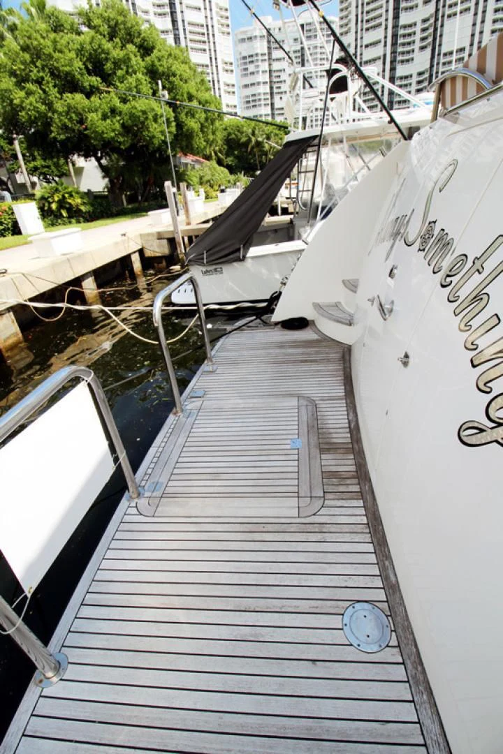 a wooden bridge over water aboard ALWAYS SOMETHING Yacht for Sale