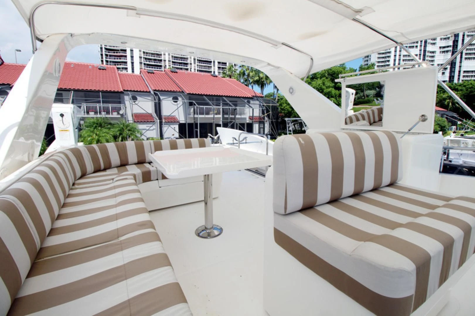 a room with a table and chairs aboard ALWAYS SOMETHING Yacht for Sale