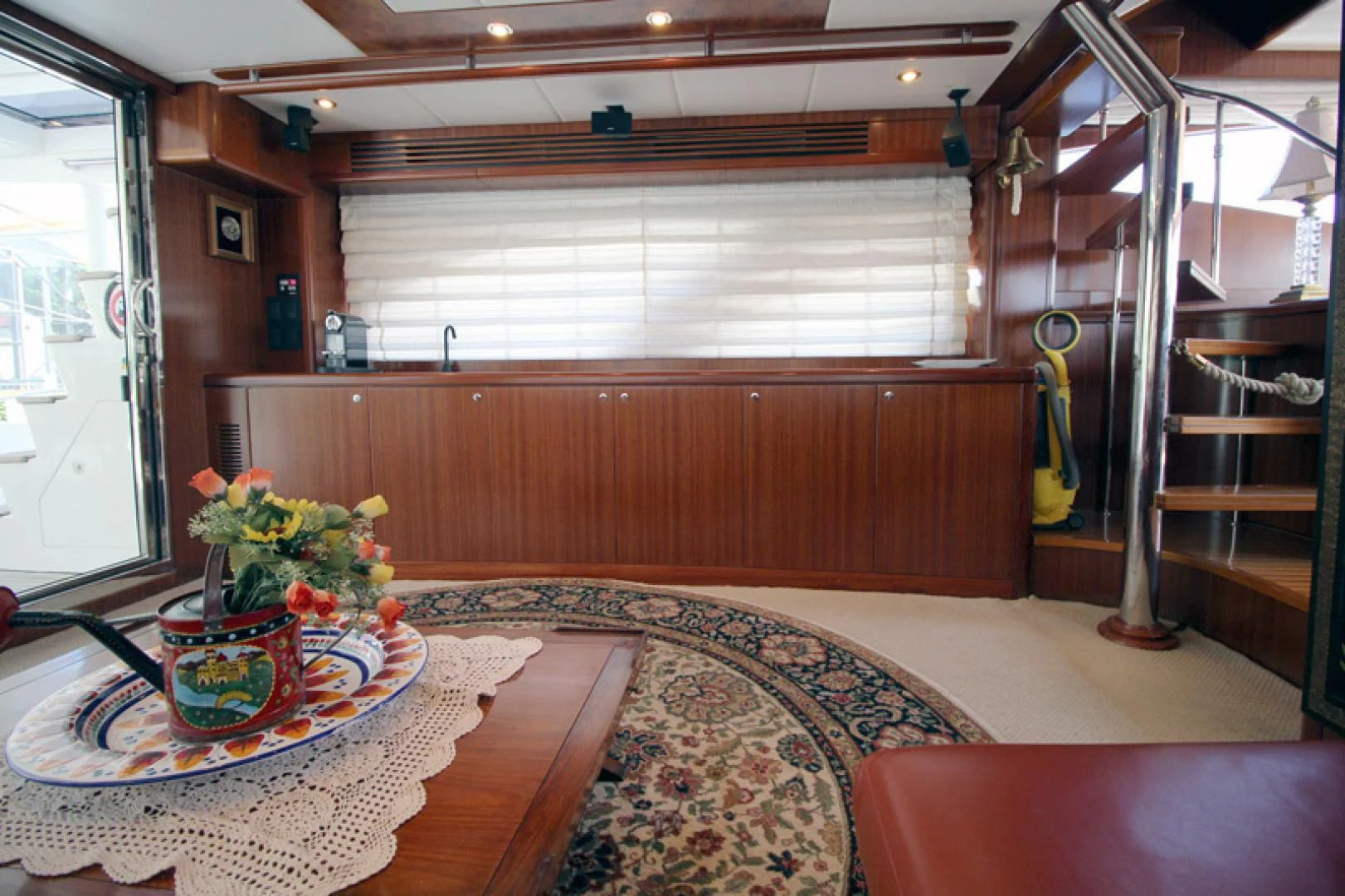 a room with a table and a bed aboard ALWAYS SOMETHING Yacht for Sale