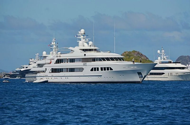 a group of white yachts in the water aboard MAJESTIC Yacht for Sale