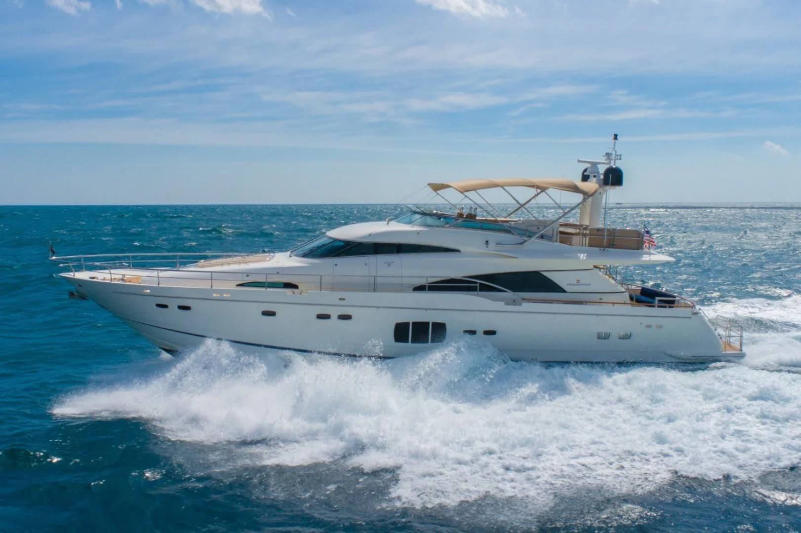 a white yacht on the water aboard DIRECT TO Yacht for Sale