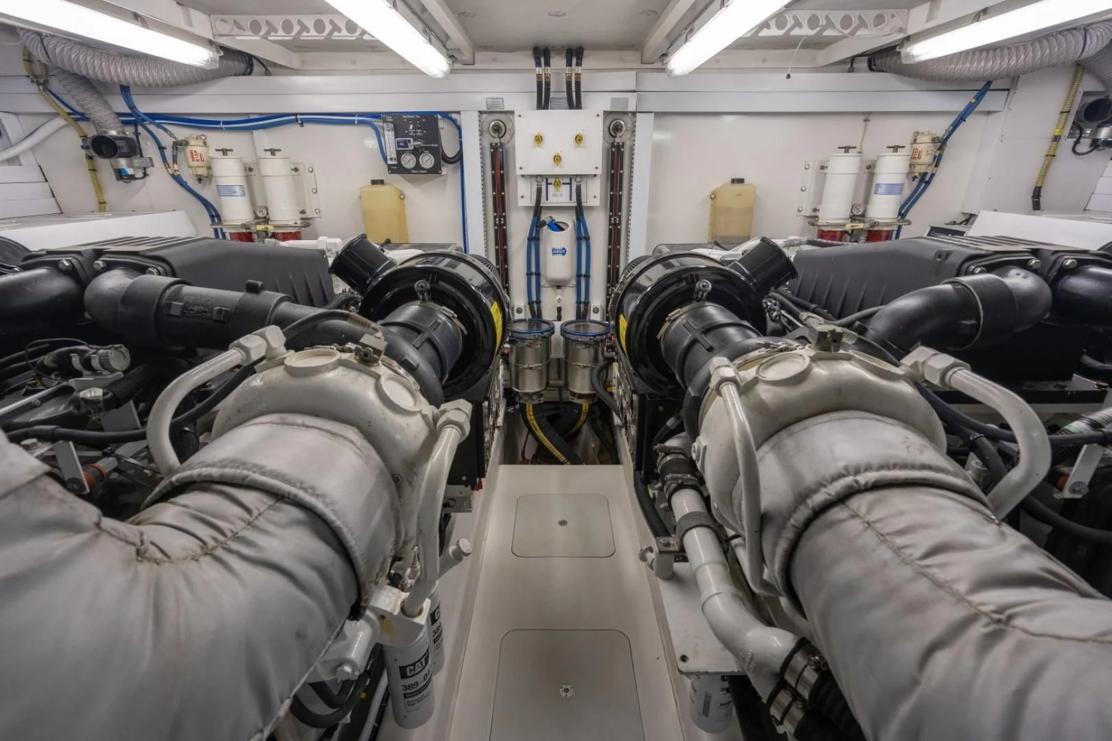 a room with machinery aboard DIRECT TO Yacht for Sale