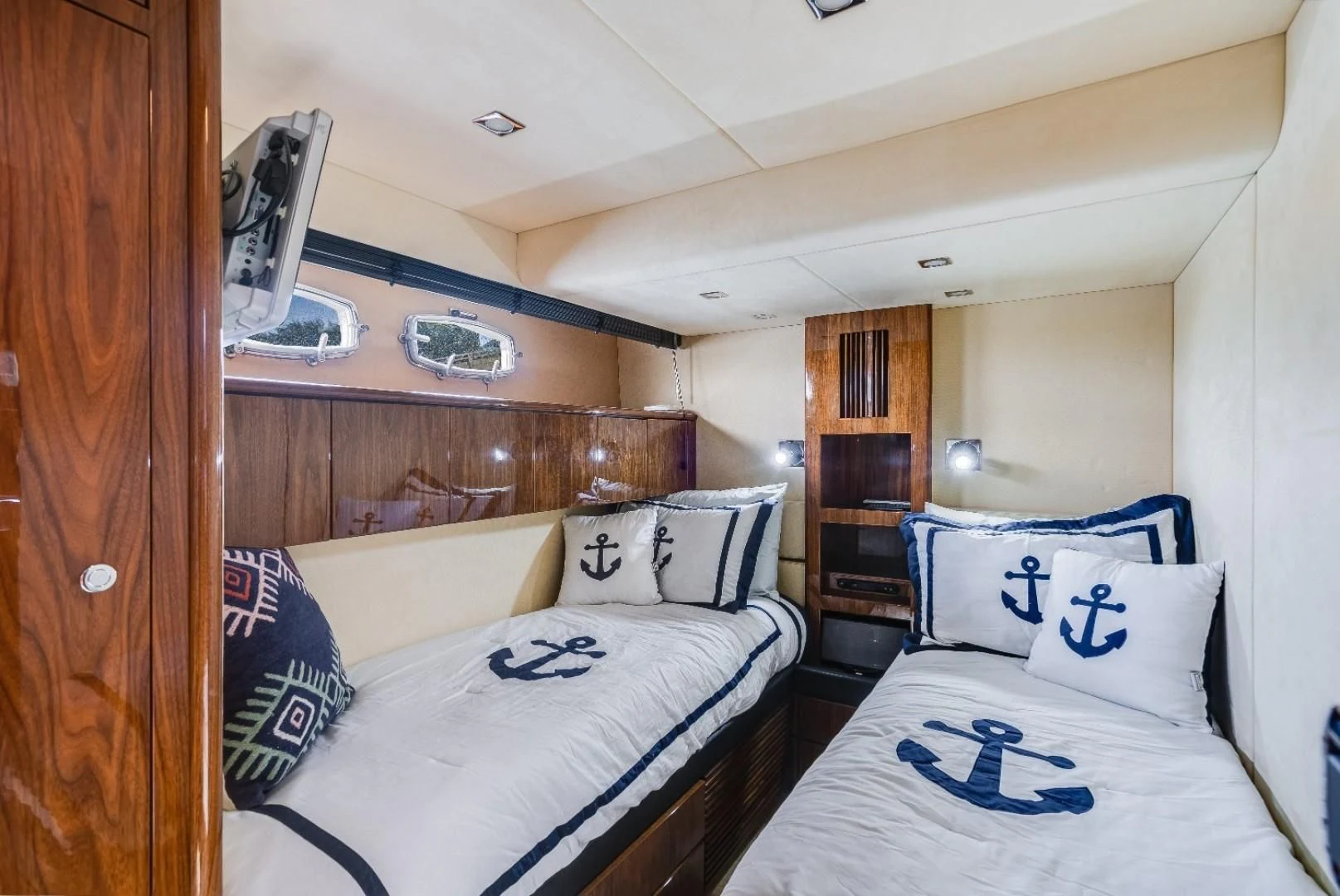 a couple of beds in a room aboard DIRECT TO Yacht for Sale