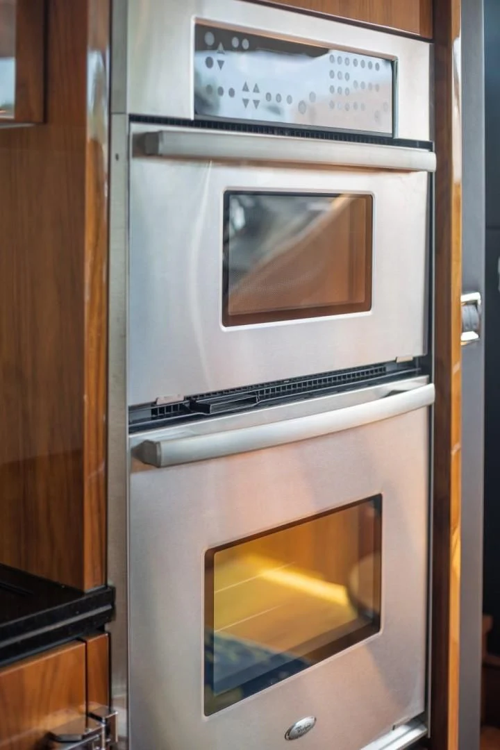a silver oven with a sign on it aboard DIRECT TO Yacht for Sale