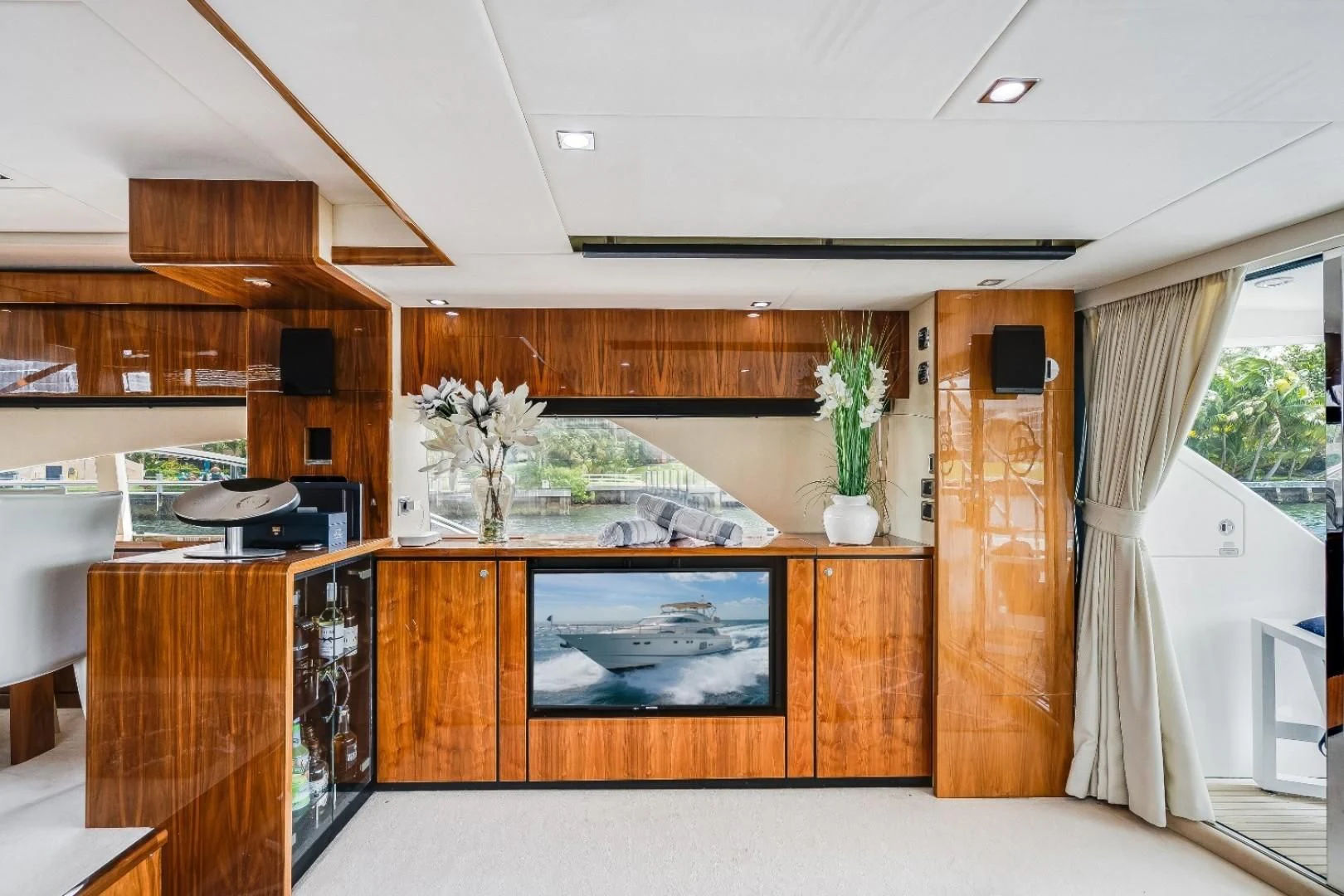 a kitchen with wooden cabinets aboard DIRECT TO Yacht for Sale