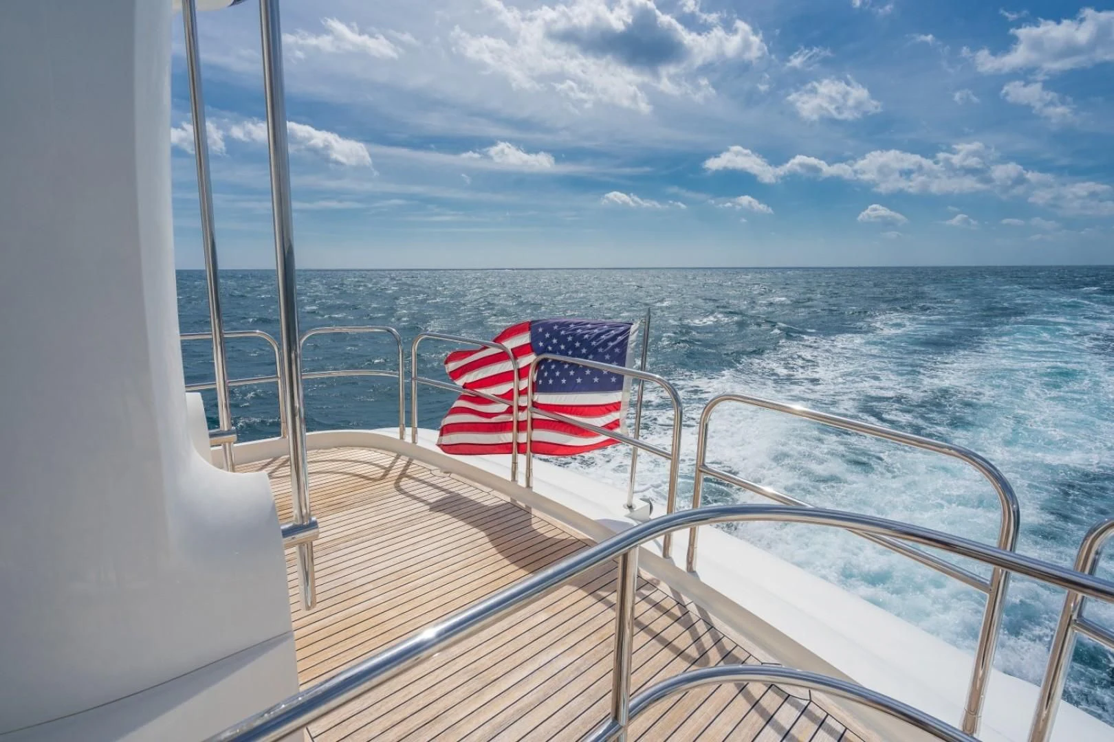 a flag on a boat aboard DIRECT TO Yacht for Sale