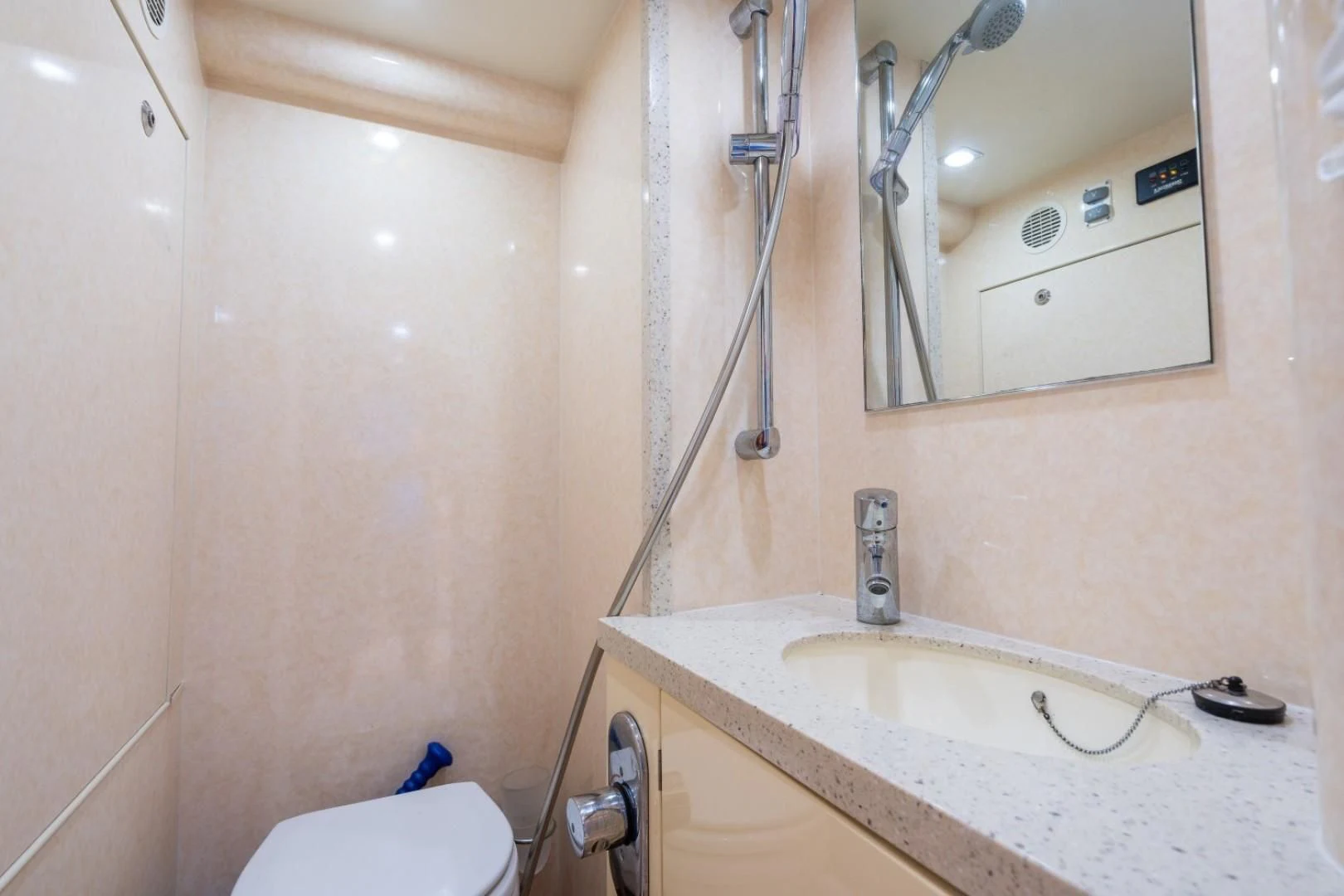 a bathroom with a sink and a mirror aboard DIRECT TO Yacht for Sale