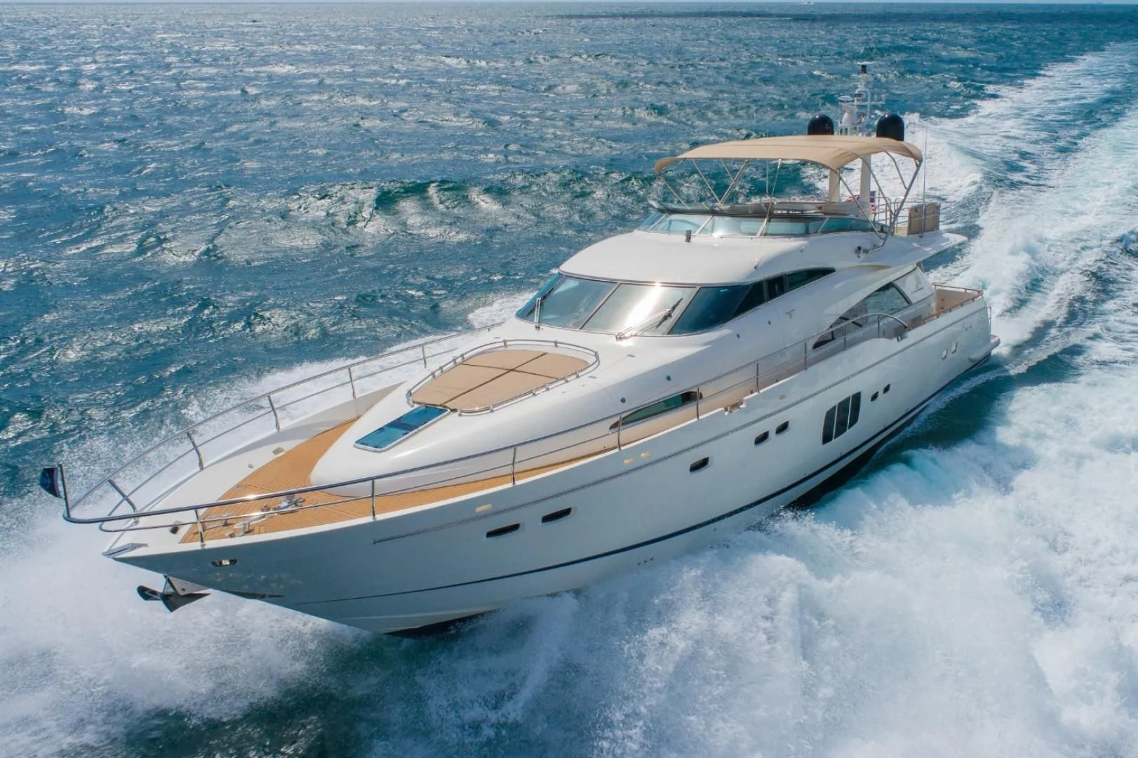 a white yacht in the water aboard DIRECT TO Yacht for Sale