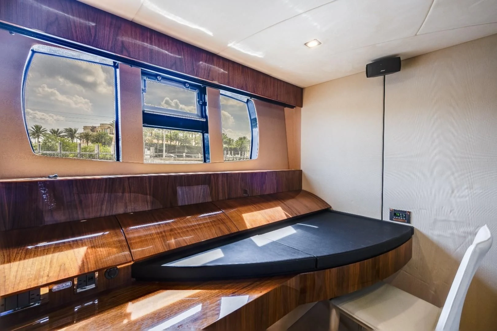 a room with a large window aboard DIRECT TO Yacht for Sale