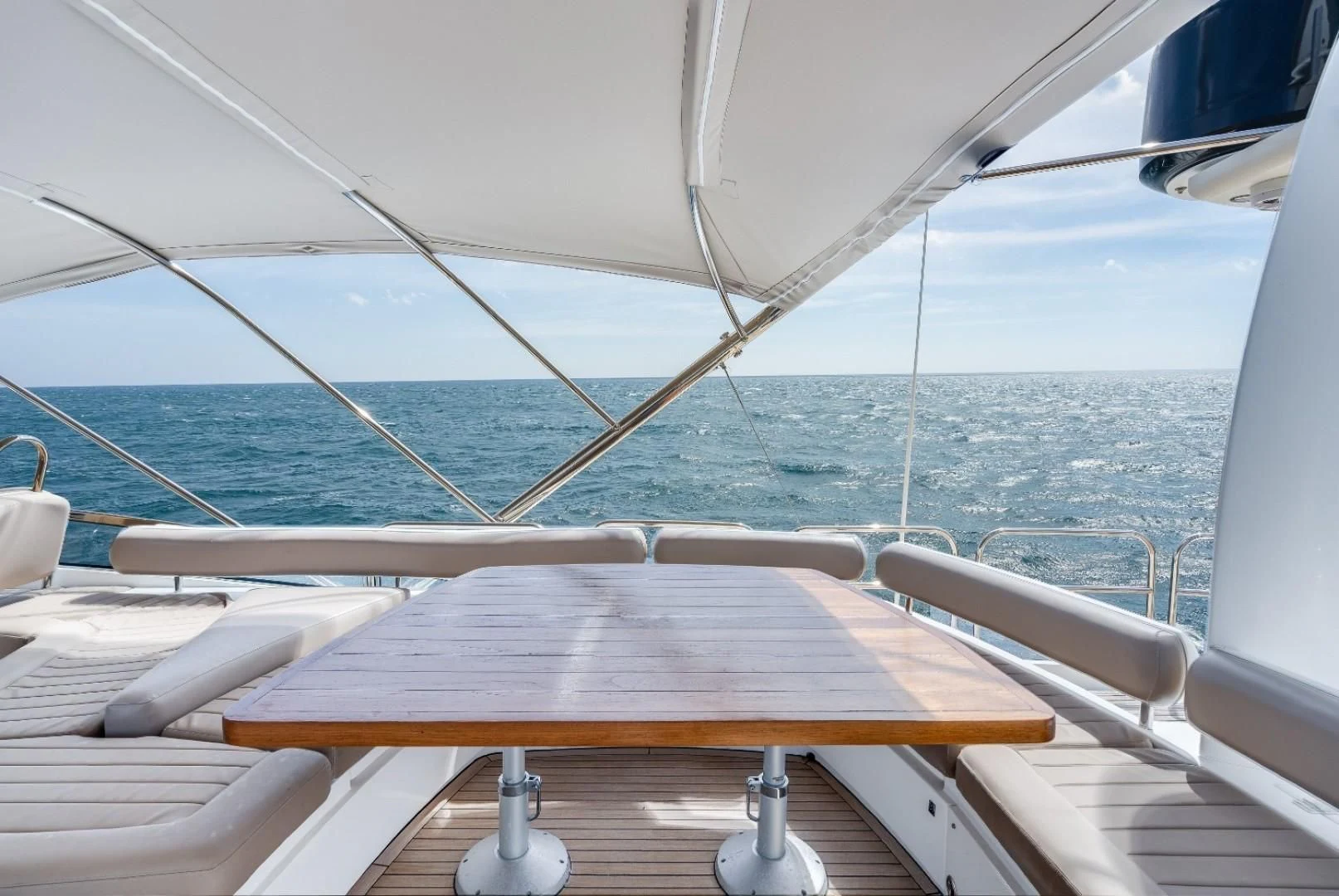 a wooden table on a boat aboard DIRECT TO Yacht for Sale