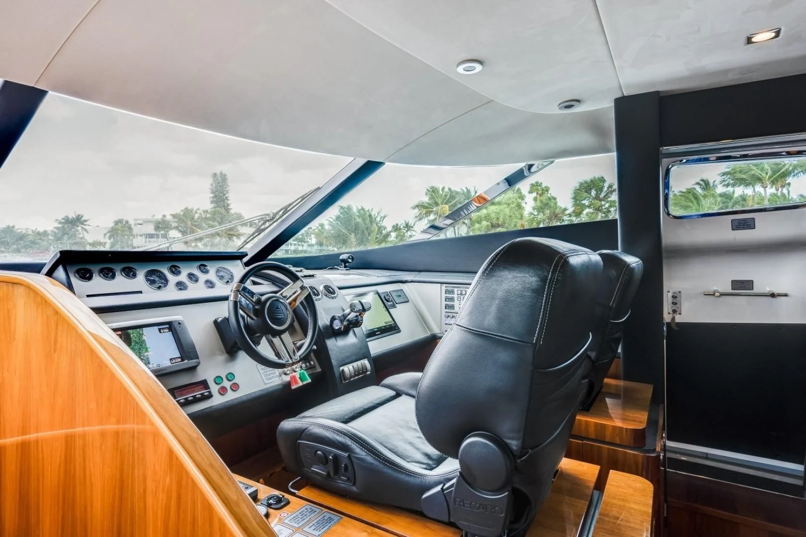 a black chair in a car aboard DIRECT TO Yacht for Sale