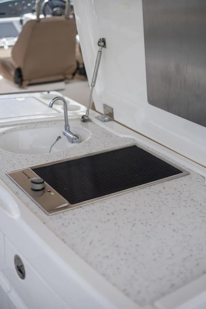 a sink and a faucet in a bathroom aboard DIRECT TO Yacht for Sale