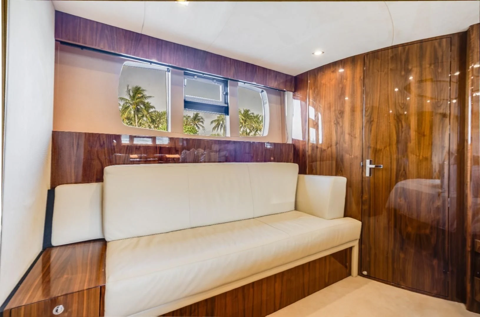 a living room with a couch aboard DIRECT TO Yacht for Sale