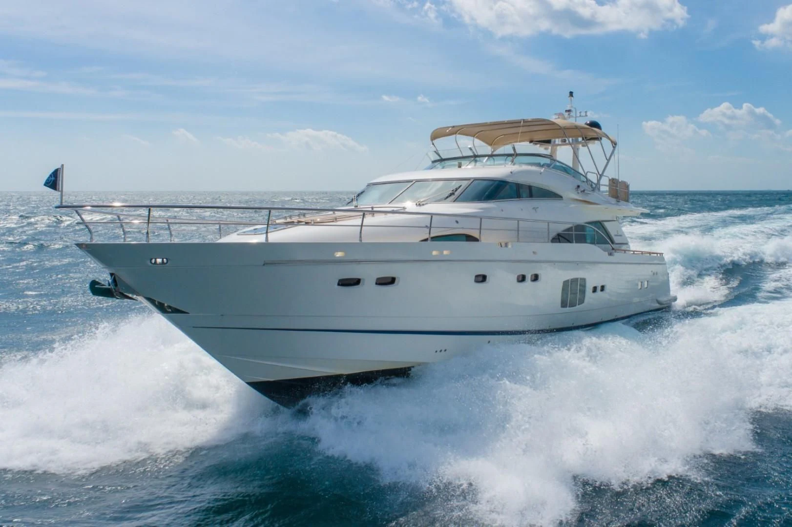 a white yacht on the water aboard DIRECT TO Yacht for Sale