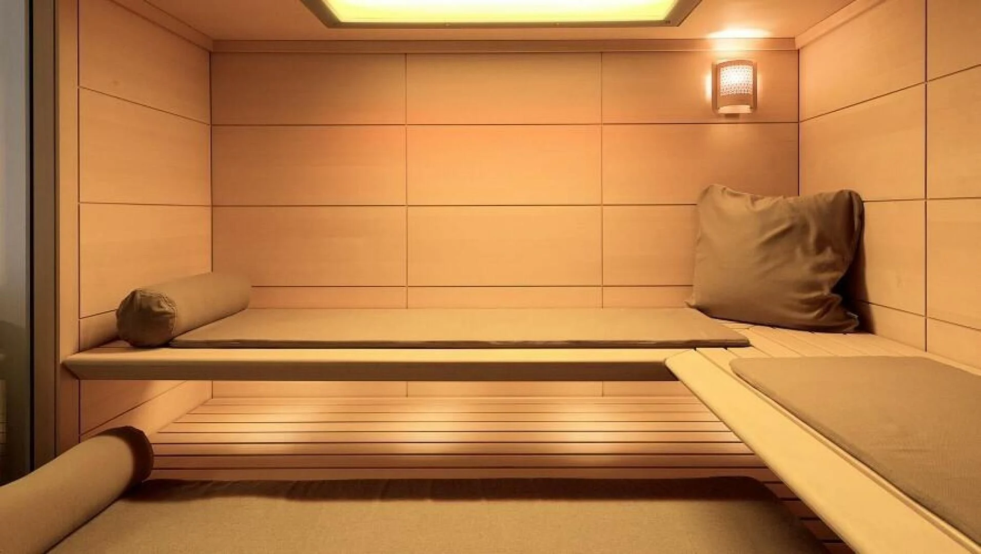 a bed with a pillow on it aboard DYNAMIQ GTT 170 Yacht for Sale