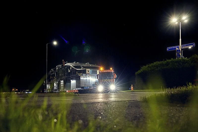 a train on a track at night aboard ULTRA G Yacht for Sale
