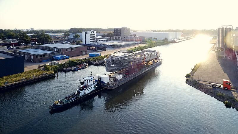 a large ship docked at a port aboard ULTRA G Yacht for Sale