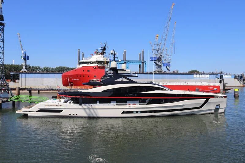 a boat docked at a pier aboard ULTRA G Yacht for Sale