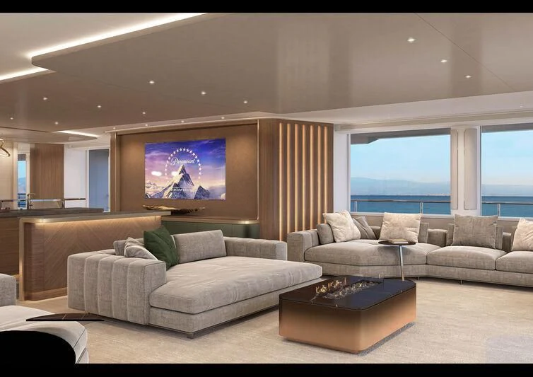 a living room with a large screen aboard ULTRA G Yacht for Sale